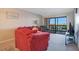Cozy living room with comfortable seating and a view of the serene outdoor balcony at 821 Bahia Del Sol Dr # 43, Ruskin, FL 33570