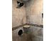 Tile shower with mosaic accents, built-in niche, and upgraded shower head at 821 Bahia Del Sol Dr # 43, Ruskin, FL 33570