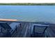 Enjoy the water view from the condo's private wooden deck with comfortable lounge chairs at 821 Bahia Del Sol Dr # 43, Ruskin, FL 33570