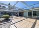 Spacious covered patio with tile flooring, perfect for outdoor dining at 236 45Th Ave, St Pete Beach, FL 33706