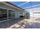 Relaxing patio area with covered seating and tile flooring at 236 45Th Ave, St Pete Beach, FL 33706