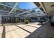 Large screened patio features a table and chairs, ideal for relaxing outdoors at 236 45Th Ave, St Pete Beach, FL 33706