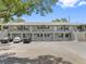 Front view of a two-story building with parking at 101 Lake Ne Ave # 225, Largo, FL 33771