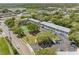 Aerial view of community with tennis court and pool at 101 Lake Ne Ave # 225, Largo, FL 33771