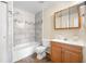 Updated bathroom with tile shower/tub combo at 101 Lake Ne Ave # 225, Largo, FL 33771