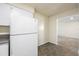 White kitchen appliances and granite countertop at 101 Lake Ne Ave # 225, Largo, FL 33771
