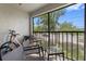 Screened balcony with patio furniture and view at 101 Lake Ne Ave # 225, Largo, FL 33771