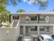 Two-story building with parking in front at 101 Lake Ne Ave # 225, Largo, FL 33771