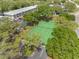 Aerial view of a green tennis court at 101 Lake Ne Ave # 225, Largo, FL 33771