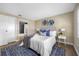 Bedroom with queen bed and ensuite bathroom at 101 Lake Ne Ave # 125, Largo, FL 33771