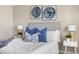 Well-lit bedroom featuring a clean bed and modern decor at 101 Lake Ne Ave # 125, Largo, FL 33771