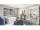 Spacious bedroom with view into living area, and modern decor at 101 Lake Ne Ave # 125, Largo, FL 33771