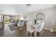 Bright dining area with white table and chairs at 101 Lake Ne Ave # 125, Largo, FL 33771