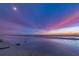 Stunning beach sunset view with colorful sky at 235 Nautilus Way, Treasure Island, FL 33706