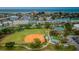 Aerial view of nearby park with baseball field and playground at 235 Nautilus Way, Treasure Island, FL 33706