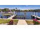 Private boat dock with lift, offering convenient waterfront access at 3228 Purple Martin Dr # 114, Punta Gorda, FL 33950