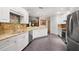 Spacious kitchen with granite countertops and stainless steel appliances at 3610 11Th N Ave, St Petersburg, FL 33713
