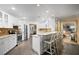 Spacious kitchen featuring white cabinets, granite counters, and stainless steel appliances at 3610 11Th N Ave, St Petersburg, FL 33713