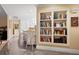 Kitchen with breakfast bar, built-in shelving and hardwood floor at 3610 11Th N Ave, St Petersburg, FL 33713
