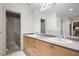 Bathroom with double vanity and walk-in shower at 3610 11Th N Ave, St Petersburg, FL 33713