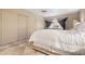 Spacious bedroom with white bedding and tile flooring at 3610 11Th N Ave, St Petersburg, FL 33713