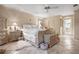 Elegant bedroom with ornate bed frame and tile flooring at 3610 11Th N Ave, St Petersburg, FL 33713