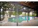 Screened-in pool with lake view at 1901 Ohio Ne Ave, St Petersburg, FL 33703