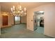 Dining room with chandelier and view to the entryway at 1901 Ohio Ne Ave, St Petersburg, FL 33703