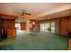 Open living area with spiral staircase and pool access at 1901 Ohio Ne Ave, St Petersburg, FL 33703