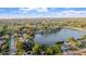 Aerial view showcasing home's location near a lake at 1901 Ohio Ne Ave, St Petersburg, FL 33703