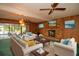 Spacious living room with fireplace and pool view at 1901 Ohio Ne Ave, St Petersburg, FL 33703