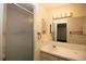 Bathroom with shower stall, single sink vanity, and mirror at 1901 Ohio Ne Ave, St Petersburg, FL 33703