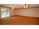 Spacious main bedroom with two ceiling fans and ample natural light at 1901 Ohio Ne Ave, St Petersburg, FL 33703