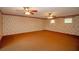 Spacious main bedroom with two ceiling fans and ample natural light at 1901 Ohio Ne Ave, St Petersburg, FL 33703