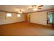 Spacious main bedroom with two ceiling fans and ample natural light at 1901 Ohio Ne Ave, St Petersburg, FL 33703