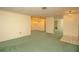 Open living room with a chandelier and mirrored wall at 1901 Ohio Ne Ave, St Petersburg, FL 33703