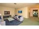 Spacious living room with comfy seating and large windows at 1901 Ohio Ne Ave, St Petersburg, FL 33703