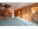 Open living area showcasing a spiral staircase and bar at 1901 Ohio Ne Ave, St Petersburg, FL 33703