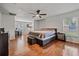 Main bedroom with king-size bed and ample space at 1729 Oakwood Estates Dr, Plant City, FL 33563