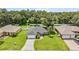 Aerial view of a single Gathering home with a large yard at 1729 Oakwood Estates Dr, Plant City, FL 33563