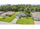 Aerial view of a single-Gathering home with a large yard at 1729 Oakwood Estates Dr, Plant City, FL 33563