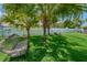 Relaxing backyard with grassy area and seating at 12125 Spartan Way # 201, Hudson, FL 34667