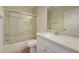 Bathroom with a tub, shower, and updated vanity at 12125 Spartan Way # 201, Hudson, FL 34667