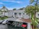 Covered parking with parking spots and cars at 12125 Spartan Way # 201, Hudson, FL 34667