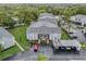 Complex aerial view, showing buildings, pool, parking, and landscaping at 12125 Spartan Way # 201, Hudson, FL 34667