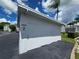 White storage units with numbered doors for residents at 12125 Spartan Way # 201, Hudson, FL 34667