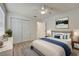 Second bedroom with a neutral color scheme and ample closet space at 12125 Spartan Way # 201, Hudson, FL 34667