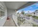 Private balcony with stairs leading down to the parking lot at 12125 Spartan Way # 201, Hudson, FL 34667