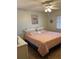 Bright bedroom featuring ceiling fan and light walls at 5157 Silent Loop # 302, New Port Richey, FL 34652