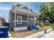 Gray house with blue porch and steps, nicely landscaped at 2907 N 17Th St, Tampa, FL 33605